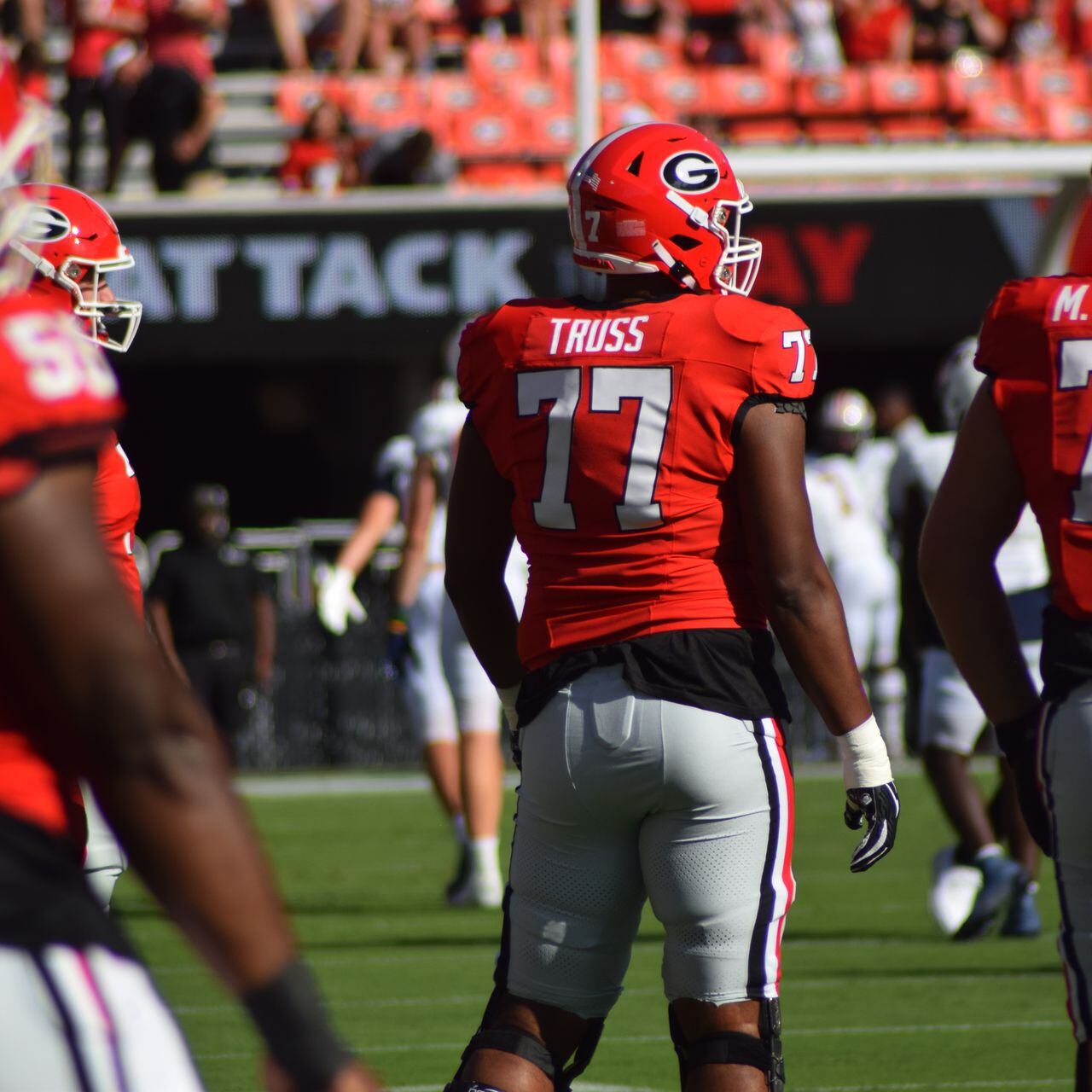 Xavier Truss shares how Georgia offensive line will continue to honor Devin  Willock: 'I'm proud wearing this'