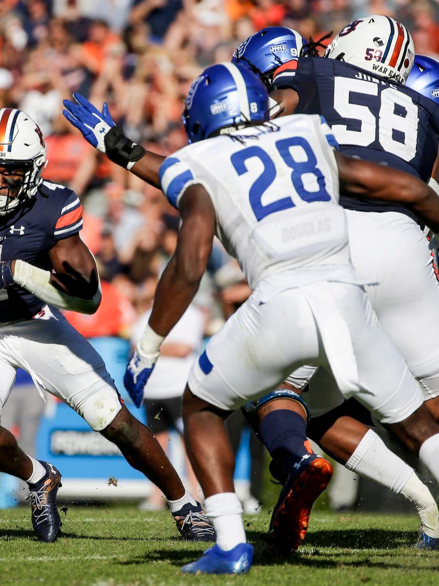 Nix, defense power No. 18 Auburn past No. 10 Ole Miss, 31-20