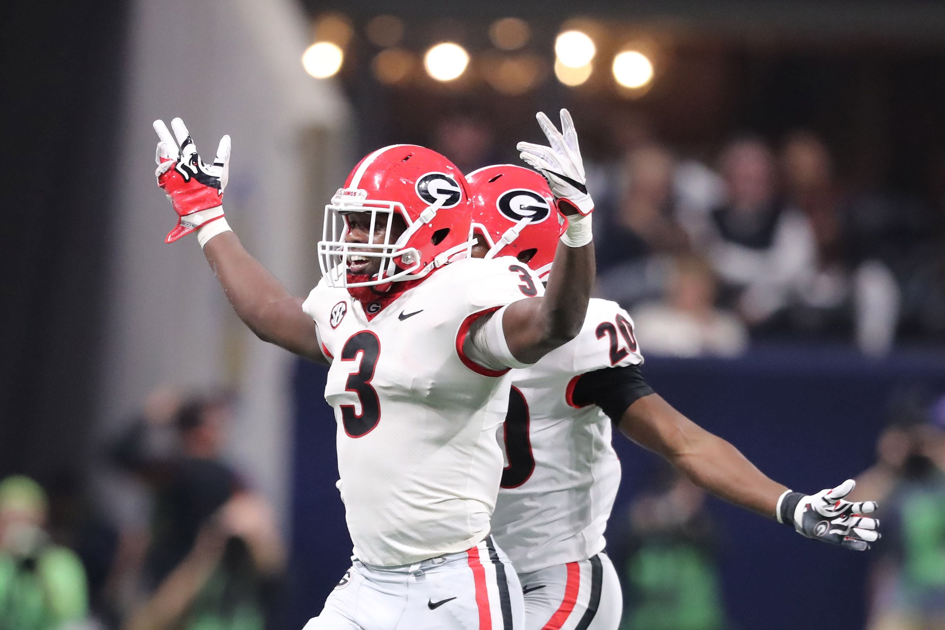 : ROQUAN SMITH BULLDOGS FOOTBALL 8X10 SPORTS ACTION