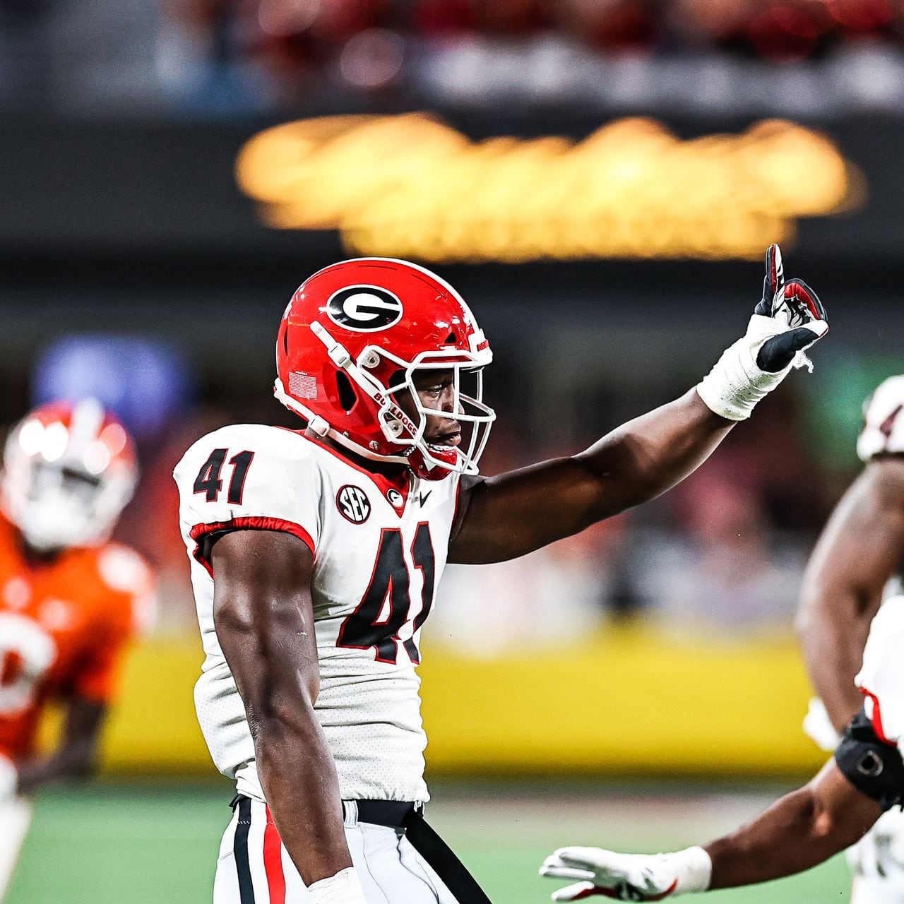 Georgia linebacker Quay Walker (36) participates in the broad jump