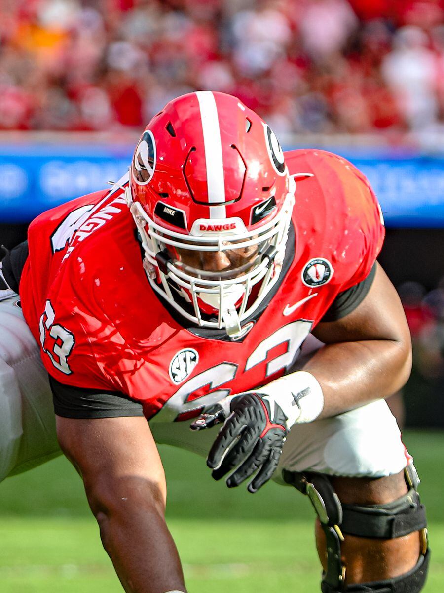 Xavier Truss shares how Georgia offensive line will continue to honor Devin  Willock: 'I'm proud wearing this'