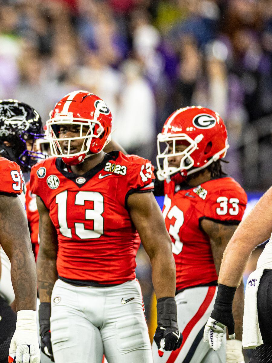 PHOTO: Aaron Murray shows off Georgia's SEC East title rings