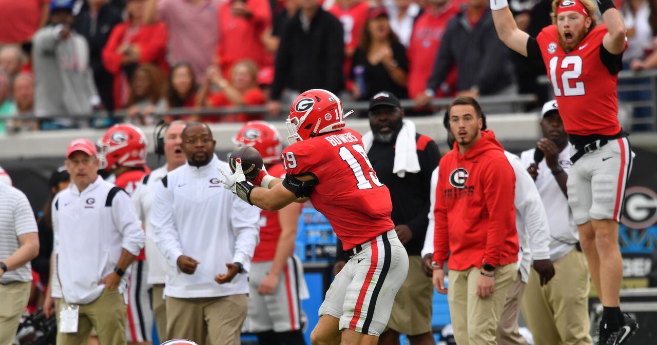 FILE - Georgia tight end Brock Bowers (19) makes a touchdown catch