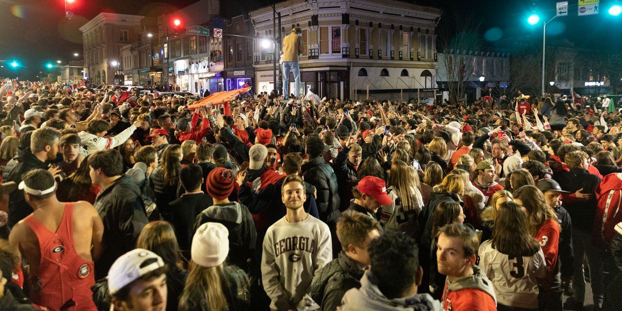 Get picture with Georgia's national championship trophy in Athens